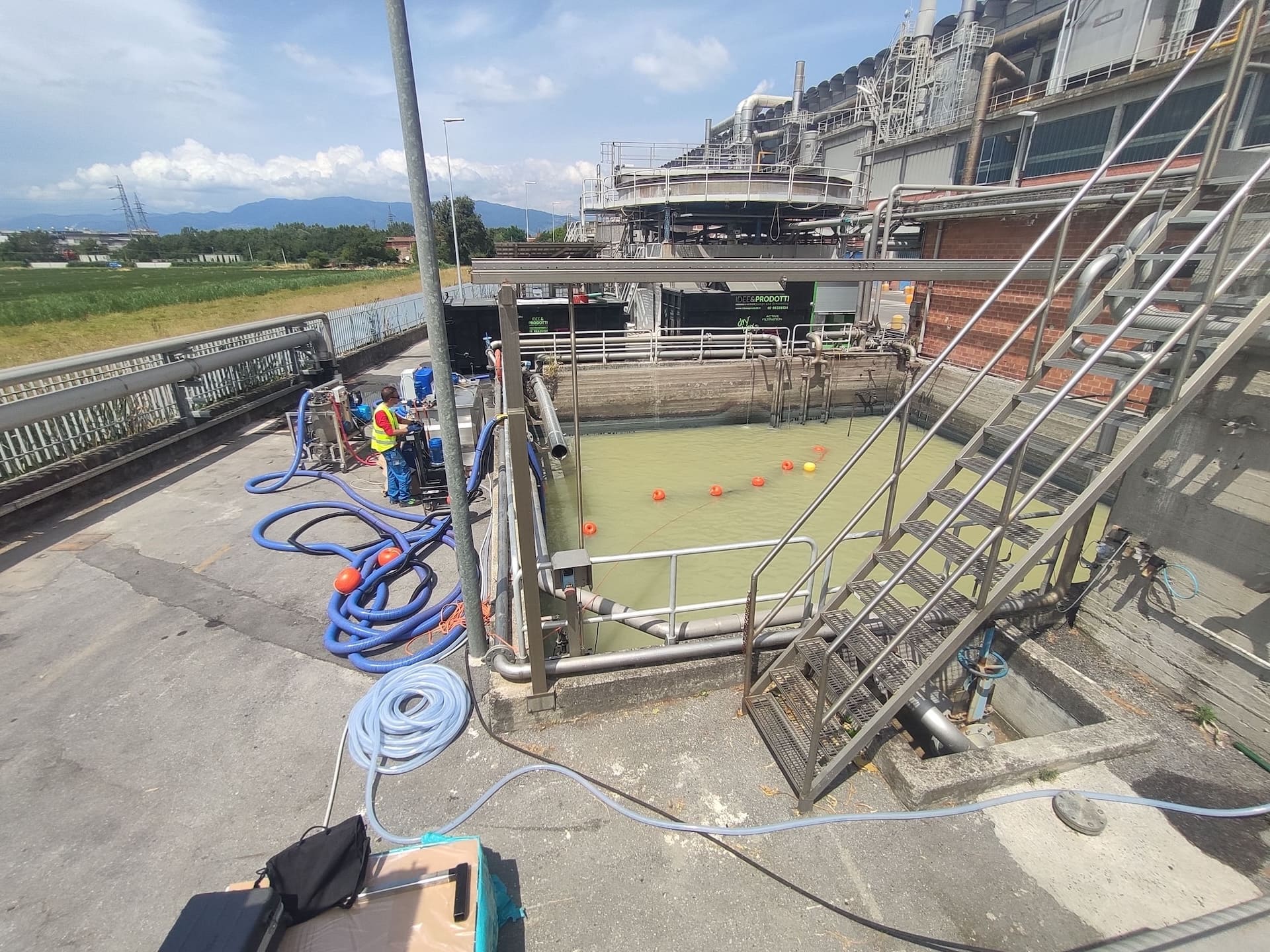 Industrial tank cleaning using a high-capacity vacuum truck without interrupting production operations.