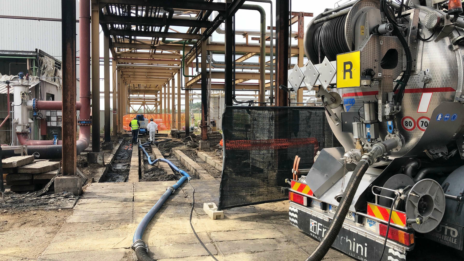 Specialist technician performing robotic probe video inspection for underground sewer pipe mapping
